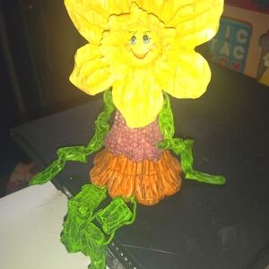 Yellow dandelion bookshelf end or table top figure